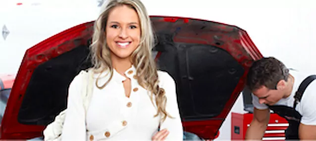 Happy customer with her car at Solidcars
